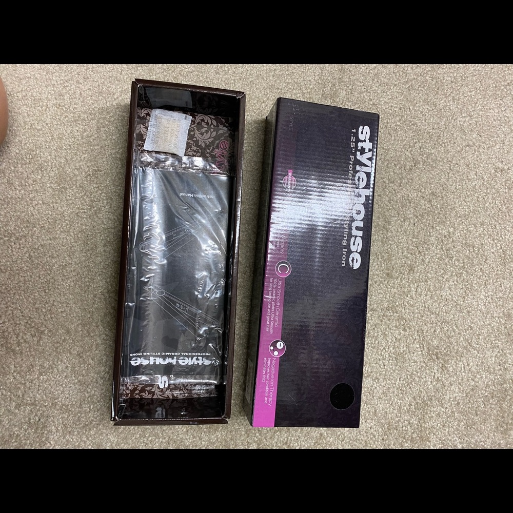 Black Stylehouse flat iron 1.25”. Never used. Smoke free home.